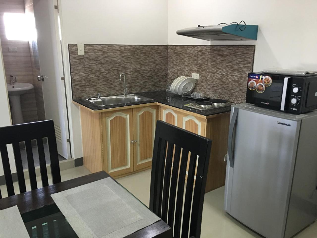 Beinte Singko De Marso Apartments Candon Extérieur photo